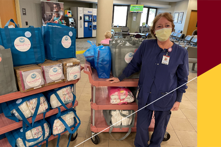 Medical staff with Second Stork diaper donation bags and DARTS transportation helping a senior.